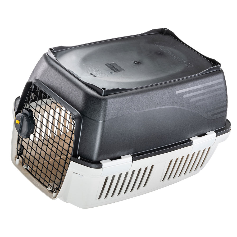 Caisse de transport pour animaux en plastique noir et blanc avec grille métallique, idéale pour chats et petits chiens. Accessoire voyage sécurisé.