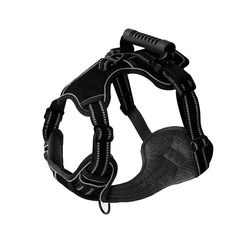 Harnais pour chien noir, réglable et rembourré, avec poignée de contrôle et bandes réfléchissantes. Accessoire de sécurité pour promenade canine.