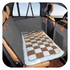 Housse de siège auto grise pour animaux, matelassée, protection imperméable, installation facile, idéale pour voyager avec des chiens en toute sécurité.